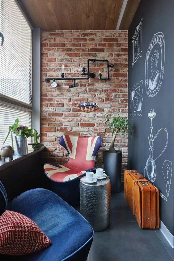 Varanda com parede de ardósia em estilo loft
