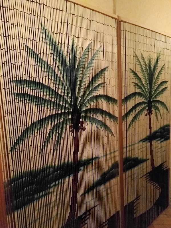cortinas de bambu com palmeiras