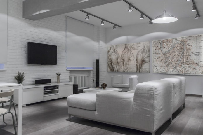 decoração e iluminação na sala de estar em tons de branco