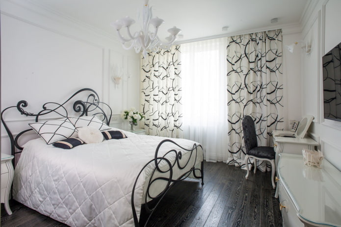 móveis no interior do quarto em tons de branco