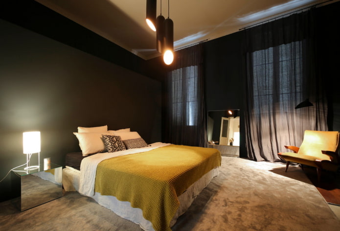 têxteis no interior do quarto em tons de preto