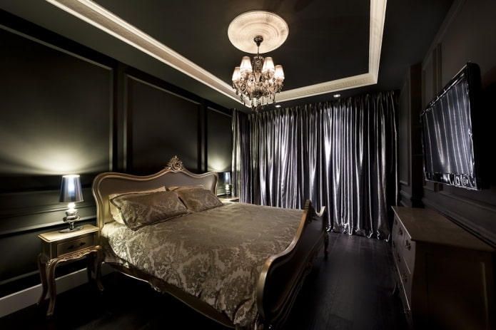 móveis no interior do quarto em tons de preto