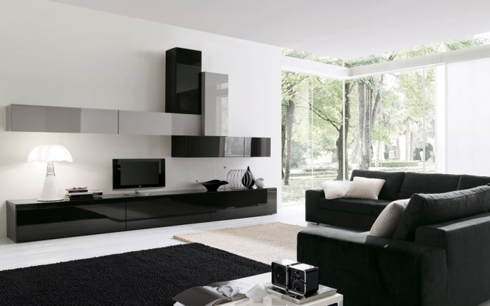 móveis e tecidos na sala de estar em tons de preto e branco