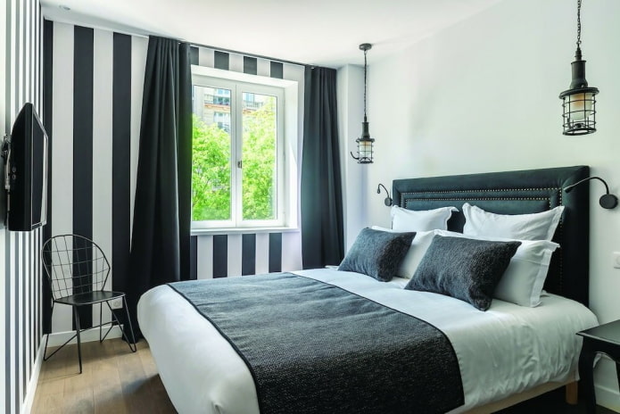 decoração e iluminação de quarto em preto e branco