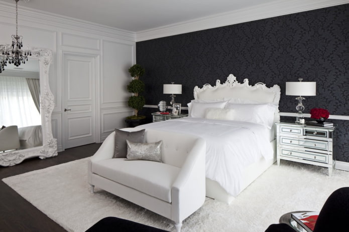 móveis no interior do quarto em tons de preto e branco