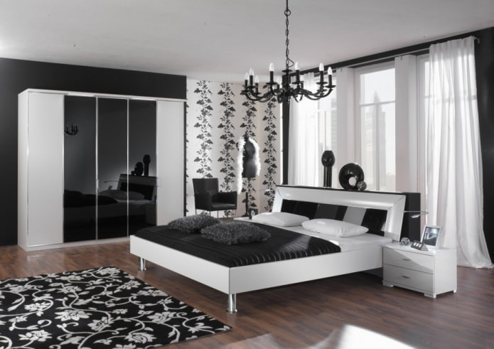 móveis no interior do quarto em tons de preto e branco