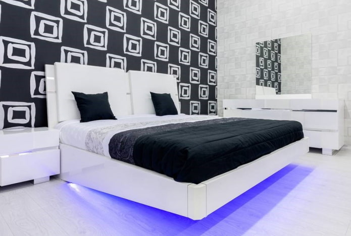móveis no interior do quarto em tons de preto e branco