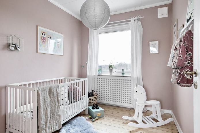 design de um quarto de bebê para uma menina recém-nascida