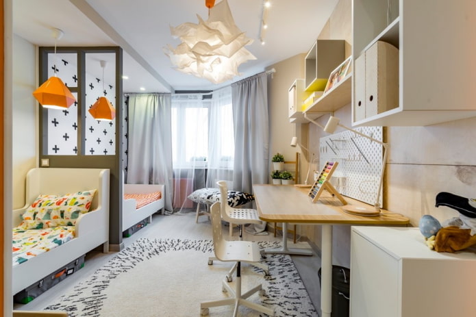 2 camas em um quarto de bebê
