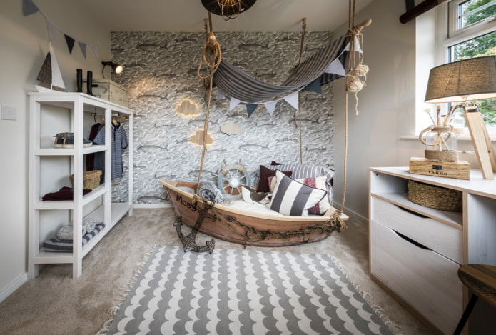 móveis no interior do quarto do bebê em estilo náutico