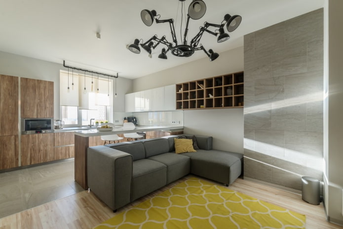 modelo de sofá modular com pufe no interior