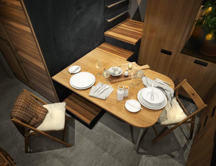 área de jantar em um apartamento de 15 m².