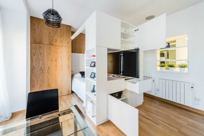 arranjo de móveis no interior de um apartamento estúdio