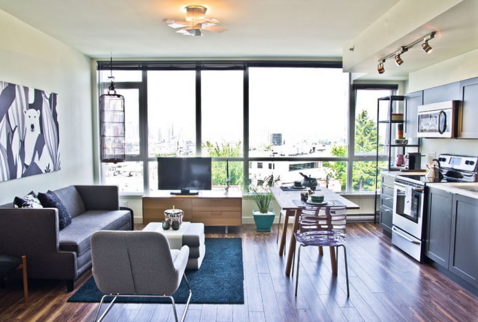 interior de apartamento estúdio com janelas panorâmicas