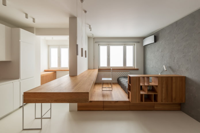 interior de apartamento estúdio com duas janelas