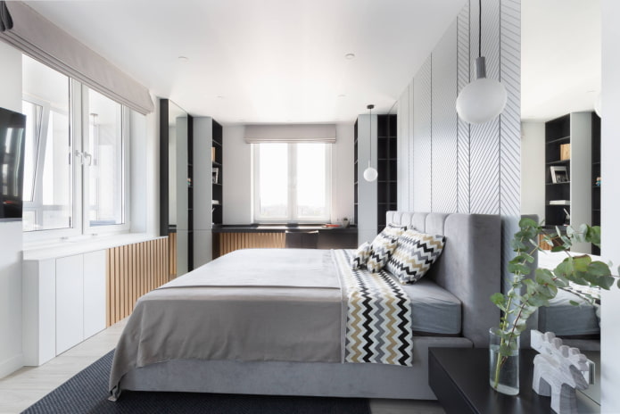 Quarto com TV na parede