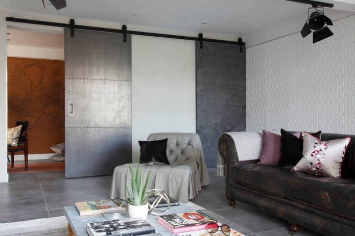portas de celeiro em uma sala de estar em estilo loft