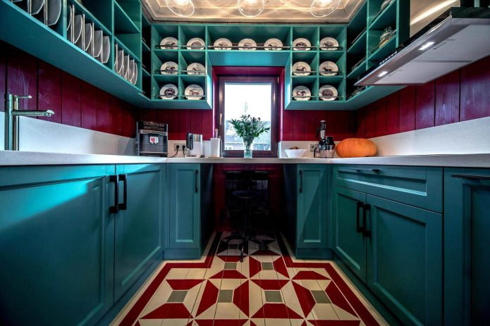 cozinha com um conjunto azul em forma de U