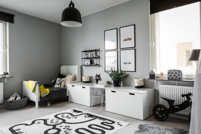 móveis e decoração no interior de um berçário cinza