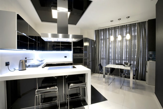 conjunto preto em forma de U com tampo de mesa branco