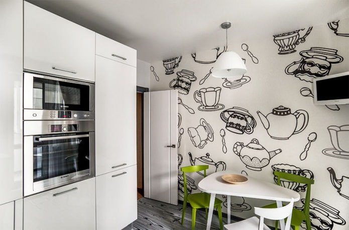 interior de cozinha preto e branco com adição de verde