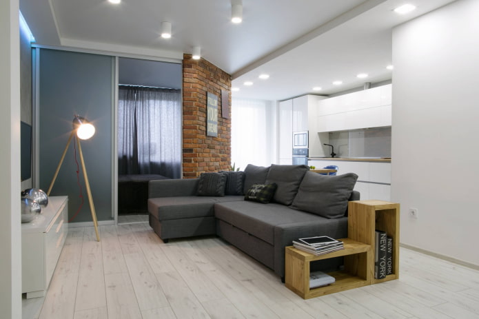 Um apartamento de dois cômodos a partir de um apartamento de um cômodo em estilo minimalista