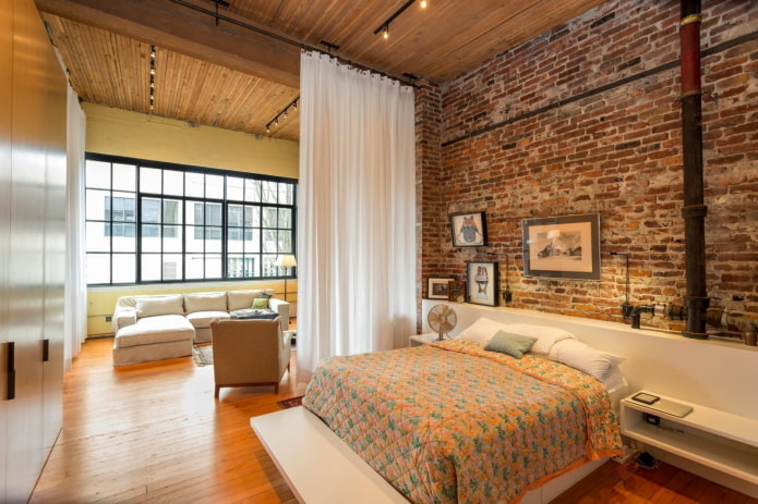Estilo loft em um quarto-sala de estar