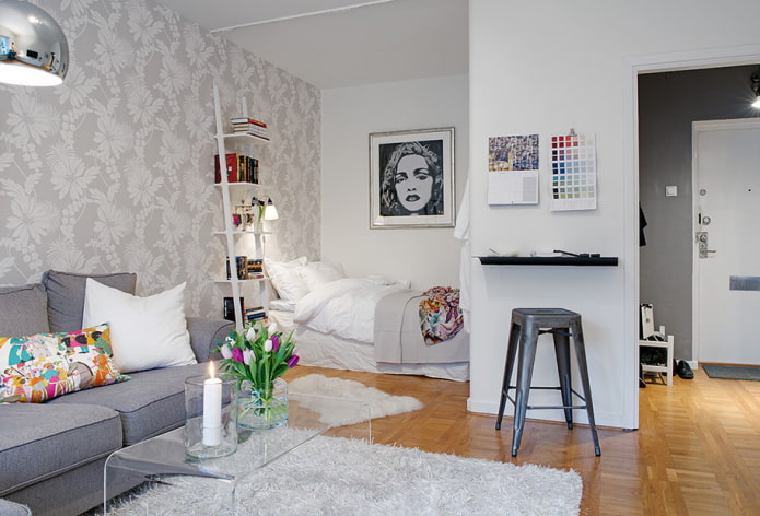 nicho com cama em apartamento de um cômodo