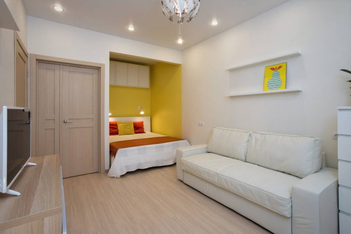 nicho com cama em apartamento de um cômodo