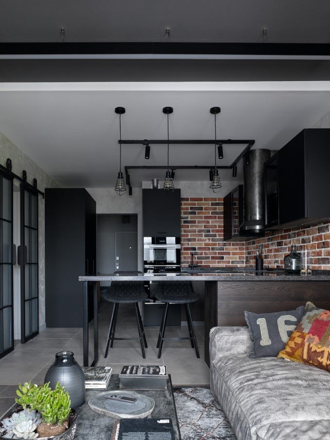 estúdio em estilo loft com balcão de bar