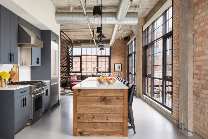 cozinha com sala de estar em estilo loft