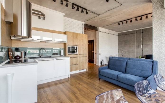 sofá no interior da cozinha em estilo loft
