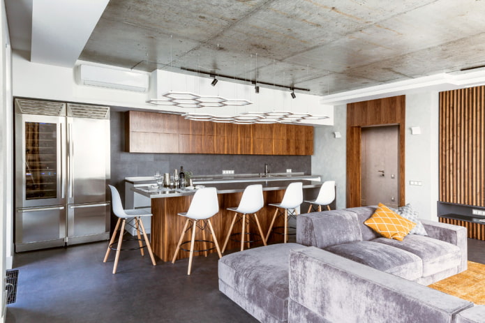 ilha no interior da cozinha e sala de estar