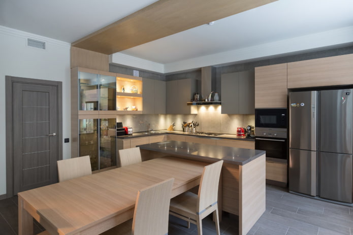 ilha com mesa de jantar no interior da cozinha