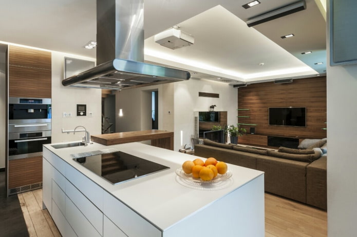 ilha no interior da cozinha e sala de estar