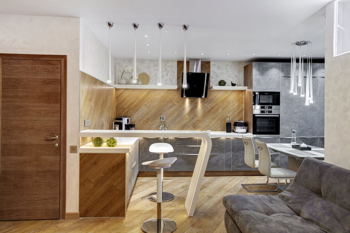 interior de uma cozinha-estúdio com balcão de bar