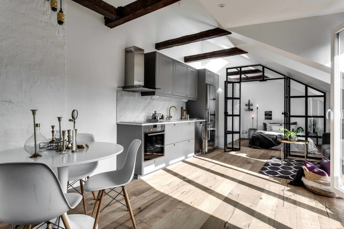 Design de interiores de uma cozinha-estúdio em estilo escandinavo