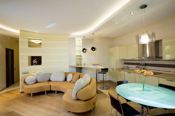 interior de cozinha-estúdio com zoneamento em forma de iluminação