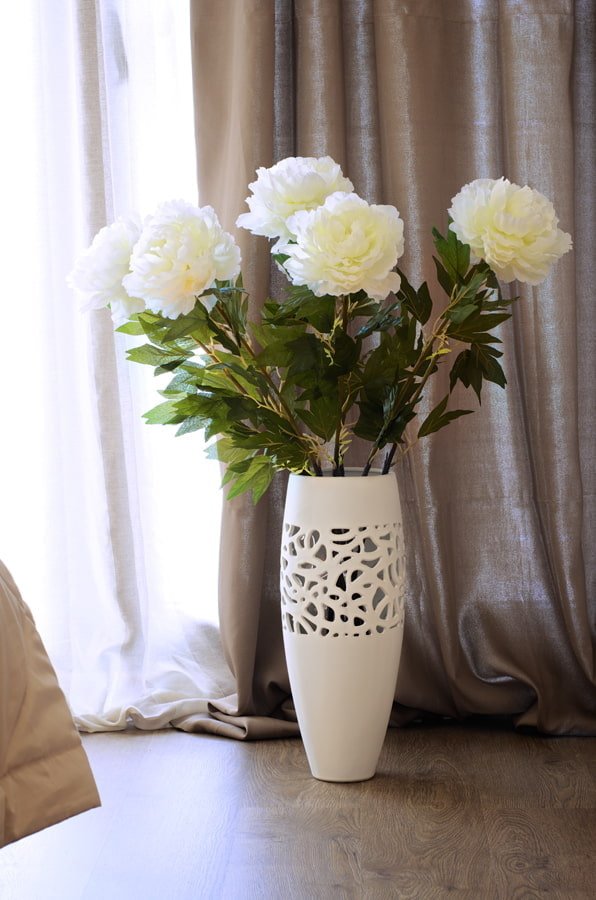 Vaso vazado com flores