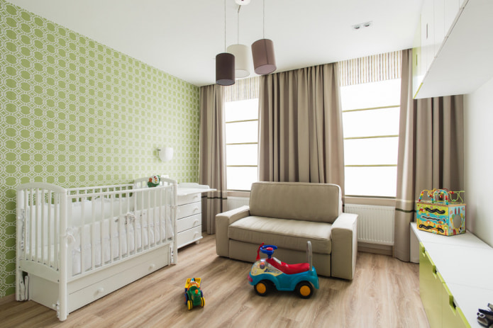 Papel de parede verde no quarto do bebê para um recém-nascido