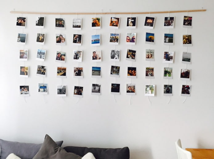 Fotos Polaroid na parede do interior