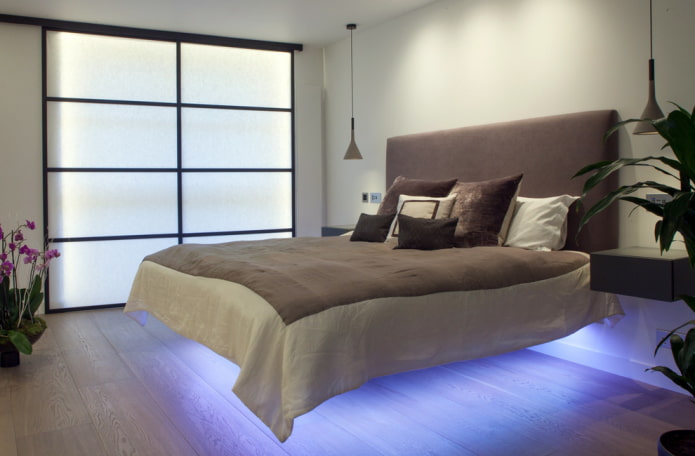 cama com efeito flutuante e iluminação