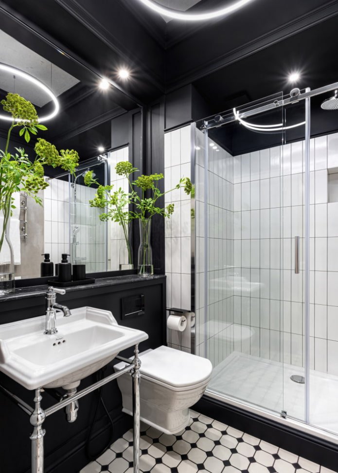 Banheiro preto e branco com tinta e azulejos