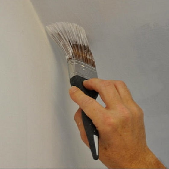 Pintando cantos com um pincel