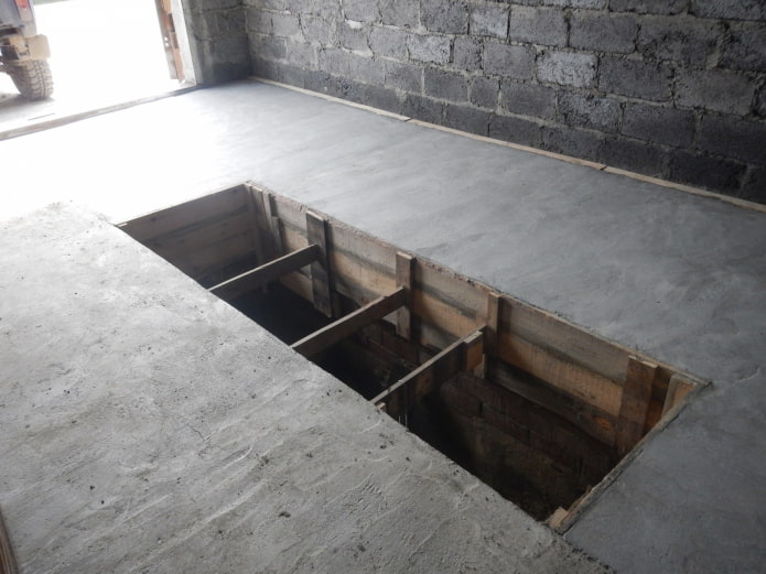 piso de concreto em garagem com fosso