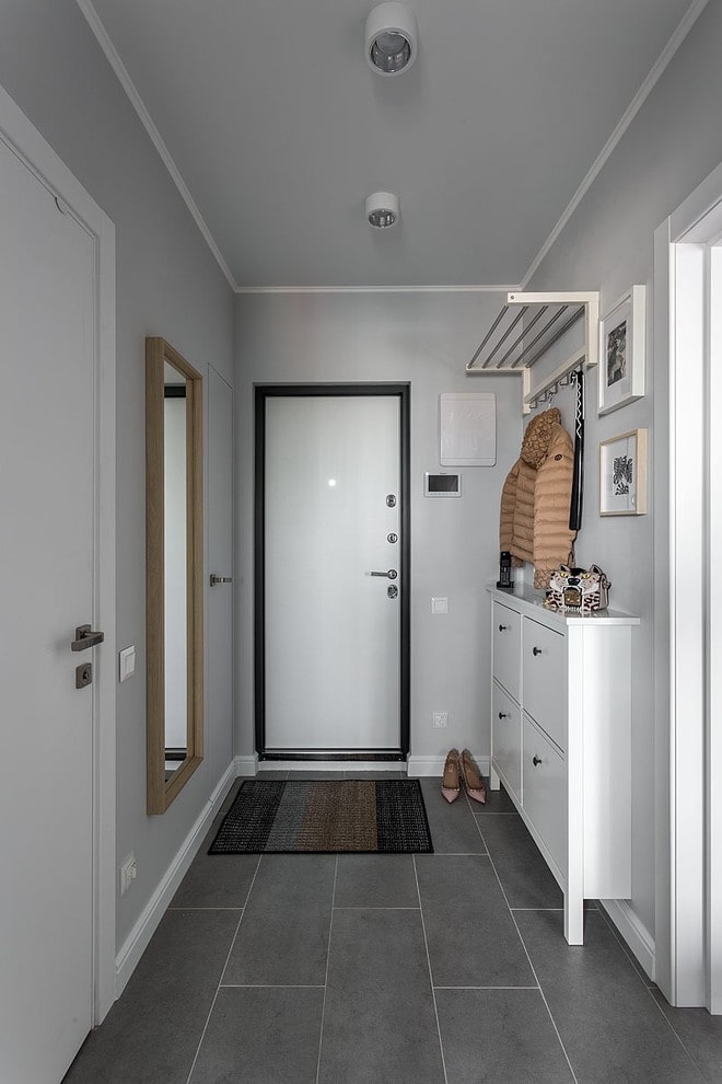 design de um corredor cinza em estilo escandinavo