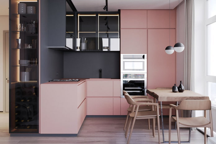 móveis e eletrodomésticos no interior da cozinha em tons de rosa