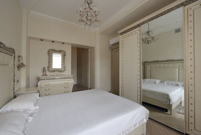 guarda-roupa deslizante no interior do quarto em estilo clássico