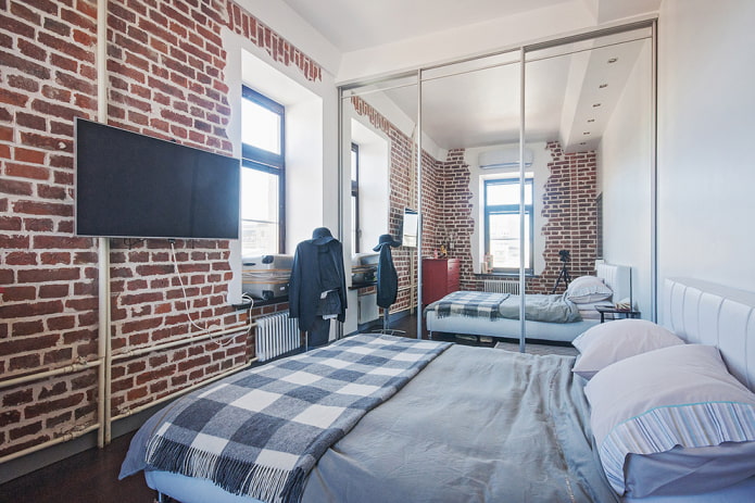 guarda-roupa no interior de um quarto em estilo loft