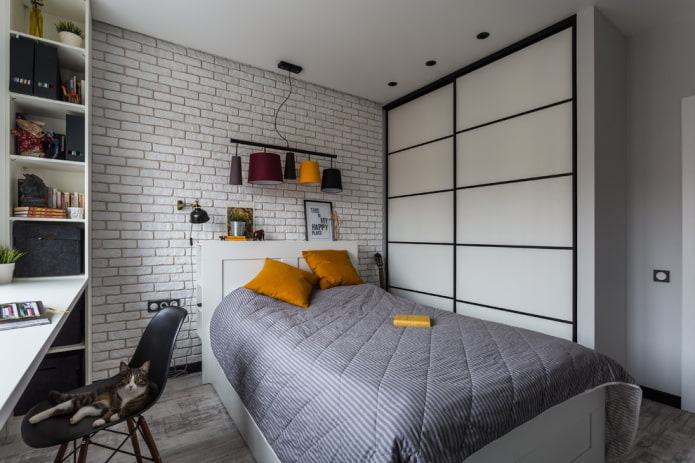 Guarda-roupa preto e branco no quarto